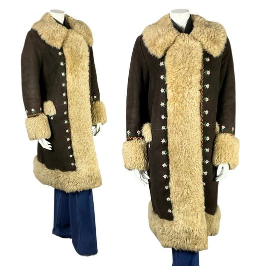 Shrinking Violets Vintage 60s 70s brown suede cream shearling coat with white daisy floral embroidery on a white mannequin